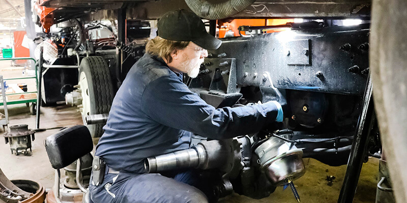 Rumpke Mechanic Repairing Heavy Equipment 1