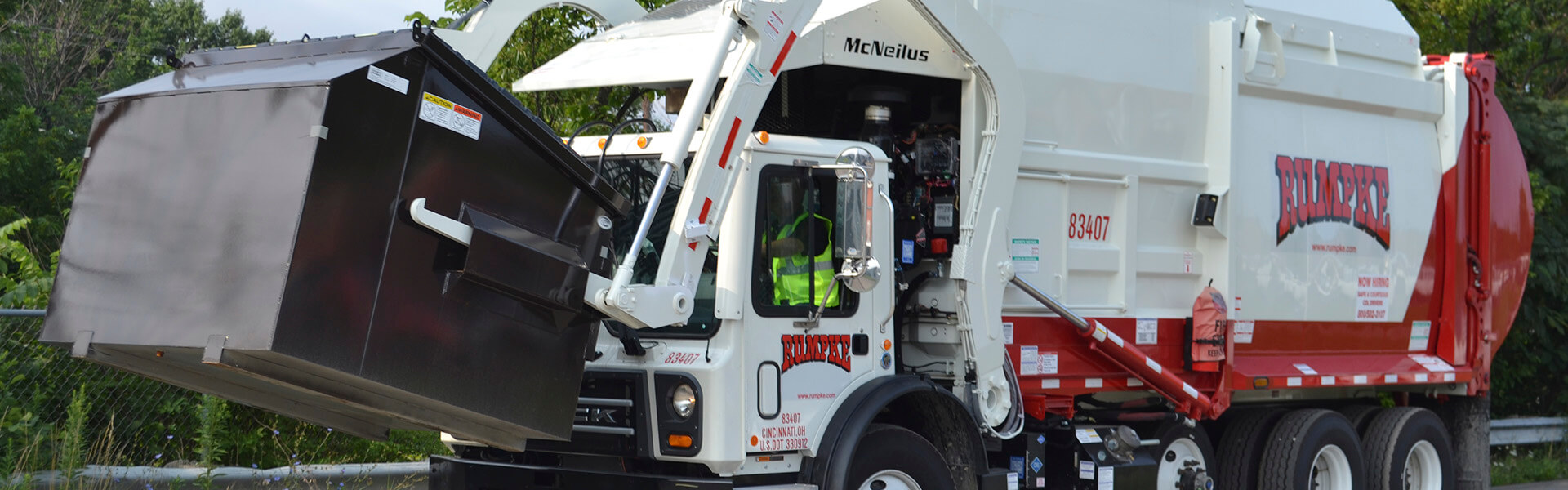 Rumpke Truck Lifting Dumpster For Tourism Waste Recycling Services 1